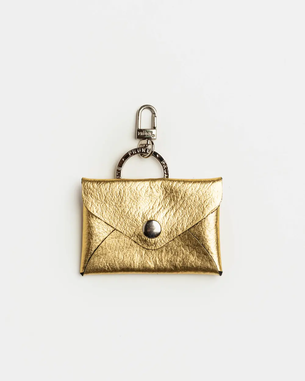 Llavero Charm Mila en cuero graneado metalizado