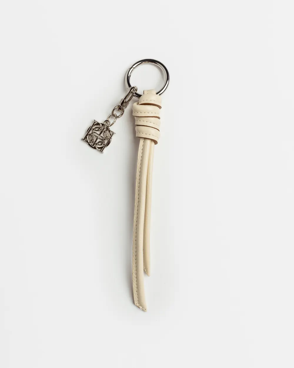 Llavero Charm Coin en cuero graneado